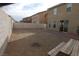 Large backyard with potential for landscaping and outdoor activities, featuring a picnic table at 2520 Living Rock St, Las Vegas, NV 89106