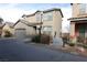 Charming two-story home with a well-maintained front yard and a two-car garage at 2520 Living Rock St, Las Vegas, NV 89106