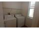 Laundry room with washer and dryer, and natural light from window at 2520 Living Rock St, Las Vegas, NV 89106