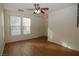 Bright living room with hardwood floors and a ceiling fan at 2520 Living Rock St, Las Vegas, NV 89106