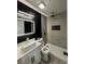 Modern bathroom showcasing a stylish vanity, contemporary fixtures, and a tiled shower at 2820 Richfield Blvd, Las Vegas, NV 89102