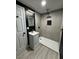 This bathroom offers a walk-in shower and modern finishes and fixtures at 2820 Richfield Blvd, Las Vegas, NV 89102