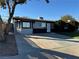 Charming single-story home features a well-manicured lawn and a spacious driveway at 2820 Richfield Blvd, Las Vegas, NV 89102