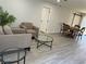 Bright living room featuring modern furnishings, light wood floors, and ample natural light at 2820 Richfield Blvd, Las Vegas, NV 89102