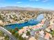 Picturesque lakefront community aerial view highlighting mountain views and waterfront homes at 2908 Reef Bay Ln, Las Vegas, NV 89128