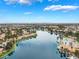 Beautiful lakefront community aerial view featuring attractive waterfront homes and blue skies at 2908 Reef Bay Ln, Las Vegas, NV 89128