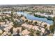 Wonderful aerial view of lakefront community with waterfront homes and lush landscaping at 2908 Reef Bay Ln, Las Vegas, NV 89128