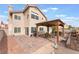 A house featuring a backyard with a covered patio area at 2908 Reef Bay Ln, Las Vegas, NV 89128