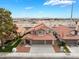 Charming two-story home with a three-car garage, well-maintained landscaping, and a tiled roof at 2908 Reef Bay Ln, Las Vegas, NV 89128