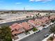 Charming two-story home with a three-car garage, well-maintained landscaping, and easy access to main roads at 2908 Reef Bay Ln, Las Vegas, NV 89128