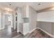 The hallway features gray floors and white cabinets for extra storage at 2908 Reef Bay Ln, Las Vegas, NV 89128