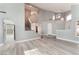 The spacious living room features vaulted ceilings, large windows, and an open floor plan at 2908 Reef Bay Ln, Las Vegas, NV 89128