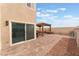 A spacious backyard patio with a covered gazebo at 2908 Reef Bay Ln, Las Vegas, NV 89128