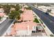 Backyard oasis with a patio, gazebo, hot tub, mature trees, and convenient access to nearby amenities and roadways at 2908 Reef Bay Ln, Las Vegas, NV 89128