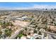 Desirable community with an aerial perspective revealing manicured lawns, nearby shopping centers, and convenient access to local amenities at 3015 Duneville St, Las Vegas, NV 89146