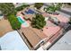 High-angle aerial view of a property with a pool, solar panels, and a spacious outdoor area at 3015 Duneville St, Las Vegas, NV 89146