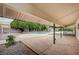Inviting backyard featuring a pool, spa, covered patio, mature trees and ample space for outdoor relaxation at 3015 Duneville St, Las Vegas, NV 89146