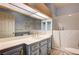 Bathroom with oversized vanity and tub at 3015 Duneville St, Las Vegas, NV 89146
