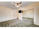 Bedroom with carpet, mirrored closet, and mounted TV at 3015 Duneville St, Las Vegas, NV 89146