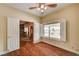 Bedroom with hardwood floors and an entryway with bi-fold doors at 3015 Duneville St, Las Vegas, NV 89146