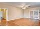 Neutral living room features hardwood floors and french doors at 3015 Duneville St, Las Vegas, NV 89146
