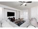 Comfortable living room featuring a large sectional sofa, tv, and recessed lighting at 3239 Robins Creek Pl, Las Vegas, NV 89135
