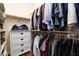 Organized walk-in closet with ample storage, shelving, and drawers for clothing and accessories at 3239 Robins Creek Pl, Las Vegas, NV 89135