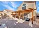 Large backyard with covered patio and ample space for outdoor activities at 3257 Coral Harbor Dr, Las Vegas, NV 89117