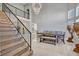 Bright dining room featuring modern chandelier and staircase at 3257 Coral Harbor Dr, Las Vegas, NV 89117