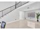 Bright living room featuring large window and modern flooring at 3257 Coral Harbor Dr, Las Vegas, NV 89117