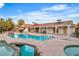 A spacious pool and spa in a lush backyard; perfect for entertaining and enjoying the sunny outdoors at 3334 W Mardon Ave, Las Vegas, NV 89139