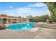 A backyard pool featuring rock waterfall and steps to a tanning deck at 3334 W Mardon Ave, Las Vegas, NV 89139