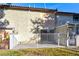 Backyard with a patio surrounded by a decorative iron fence at 3339 Duece St, Las Vegas, NV 89121