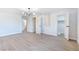 Spacious room with light wood floors and modern lighting at 3339 Duece St, Las Vegas, NV 89121