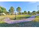 Well-maintained community park with lush greenery and walking path, perfect for outdoor activities at 3339 Duece St, Las Vegas, NV 89121