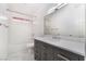 Modern bathroom features a vanity with countertop sink, subway tile and a shower over tub at 3517 S Dapple Gray Rd, Las Vegas, NV 89147