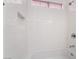 Shower with a subway tile wall and shower fixture in an updated bathroom at 3517 S Dapple Gray Rd, Las Vegas, NV 89147