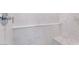 Shower featuring marble-look tiles and a built-in bench at 3517 S Dapple Gray Rd, Las Vegas, NV 89147