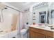 Bathroom with a single vanity, a toilet and a shower/tub combo with a curtain at 3661 Margarita Way, Las Vegas, NV 89103