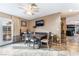 Dining area with neutral colored flooring and a view to the living room and back yard at 3661 Margarita Way, Las Vegas, NV 89103