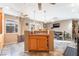 Bright eat-in kitchen area with tile floors, offering a view of both the dining area and backyard at 3661 Margarita Way, Las Vegas, NV 89103