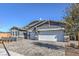 Beautiful single-story home featuring a spacious driveway and well-maintained yard at 494 Copper Falcon Ave, Henderson, NV 89011