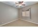 Bedroom with a ceiling fan, window and carpet at 519 Via Garofano Ave, Henderson, NV 89011