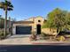 Charming single-story home with desert landscaping, attached garage, and inviting entrance at 519 Via Garofano Ave, Henderson, NV 89011
