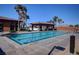 Inviting lap pool with clear water and cabana, set in a beautifully landscaped community area at 519 Via Garofano Ave, Henderson, NV 89011