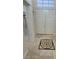 Elegant foyer features decorative tile flooring and double entry doors at 5554 Chicory Falls Ct, Las Vegas, NV 89148