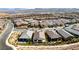 Gorgeous aerial view showcasing the community with well-maintained streets and beautiful landscaping at 59 Desert Ivy Ln, Henderson, NV 89011