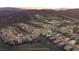 Desert community with resort-style pool and amenities nestled against a mountain range at 59 Desert Ivy Ln, Henderson, NV 89011