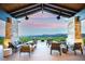 Open air patio features comfortable seating and amazing views of the valley at 59 Desert Ivy Ln, Henderson, NV 89011