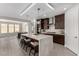 Modern kitchen featuring a quartz countertop island, stainless steel appliances, and pendant lighting at 59 Desert Ivy Ln, Henderson, NV 89011